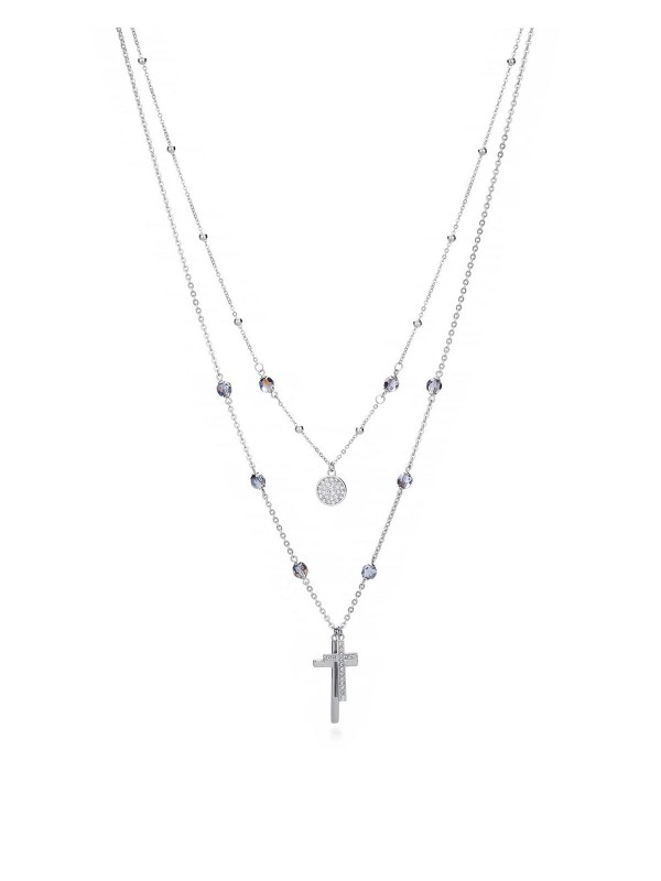 Ogrlica od nerđajućeg čelika u dva reda sa ljubičastim i belim cirkonima, na kraćem je privezak medaljon optočen cirkonima, a na dužoj ogrlici je privezak krst sa cirkonima.