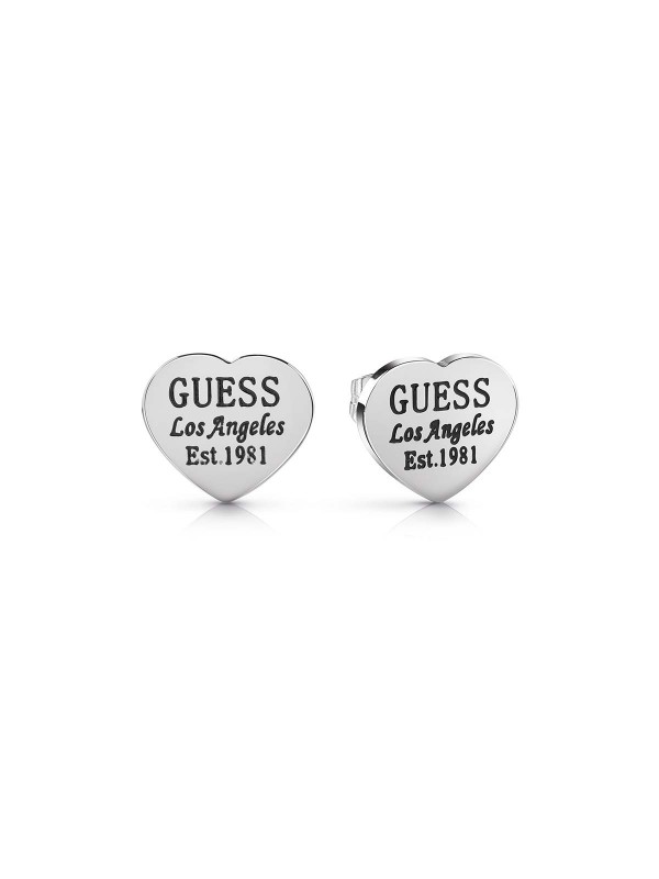 Guess minđuše od nerđajućeg čelika u boji srebra u obliku srca sa ugraviranim logotipom GUESS. Poručite već danas na S&L Jokić, dostava je besplatna.